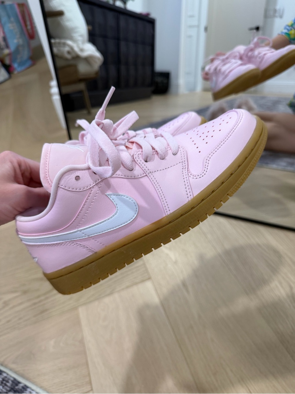 Jordan Women’s Low-Top Sneakers in Pink with White Swoosh